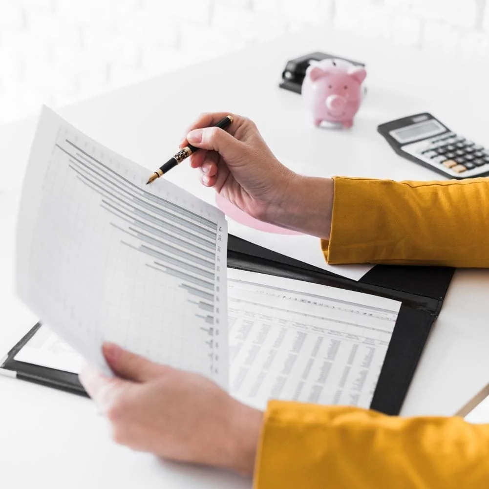 high angle woman revising documents 1